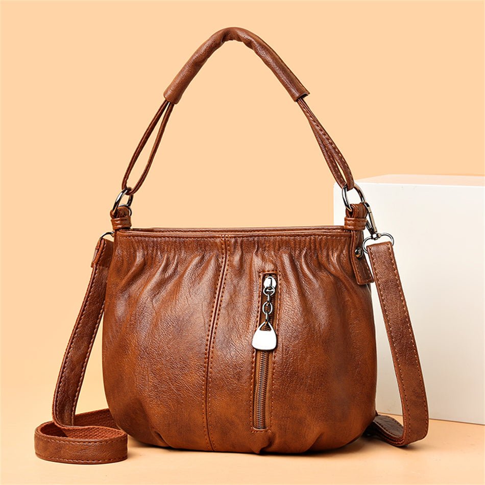 Bolsa de couro com pregas chique - Innovoda