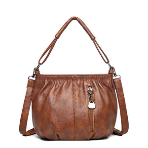 Bolsa de couro com pregas chique - Innovoda